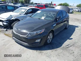 2016 Kia Optima Hybrid with VIN KNAGM4ADXG5096533, listed as a IAAI auction lot 41986694 with 1 mi miles. Bid and sale history available at carsss.com. Image 2.