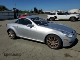 2005 Mercedes-Benz SLK 230/320 with VIN WDBWK56F05F043625, listed as a Copart auction lot 55623625 with 170,798 mi miles and Salvage title. Bid and sale history available at DreamBid. Image 4.