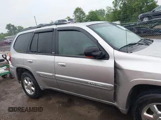 2004 GMC Envoy SLT z VIN 1GKDT13S742130352, wystawiony jako IAAI lot #42355072 z przebiegiem 170 355 mil mil oraz . Historia ofert i sprzedaży dostępna na DreamBid. Obrazek 12.