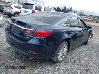 2015 Mazda 6 i Touring with VIN JM1GJ1V52F1185998, listed as a IAAI auction lot 41921373 with 101,306 mi miles and . Bid and sale history available at DreamBid. Image 4.