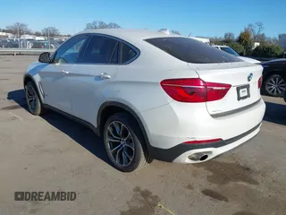 2017 BMW X6 xDrive35i z VIN 5UXKU2C3XH0U29395, wystawiony jako IAAI lot #41237496 z przebiegiem 82 836 mil mil oraz . Historia ofert i sprzedaży dostępna na DreamBid. Obrazek 3.