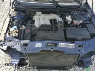 2004 Jaguar X-Type with VIN SAJEA51C44WD83361, listed as a Copart auction lot 55643545 with 54,615 mi miles and Salvage Title. Bid and sale history available at DreamBid. Image 11.