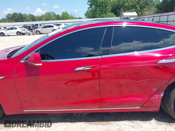2016 Tesla Model S 90D with VIN 5YJSA1E48GF144821, listed as a IAAI auction lot 42206473 with 129,624 mi miles and . Bid and sale history available at DreamBid. Image 14.