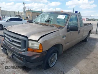 1999 Ford F-350 XL with VIN 1FTSX30F7XEC60385, listed as a IAAI auction lot 42493144 with 210,660 mi miles and . Bid and sale history available at DreamBid. Image 2.