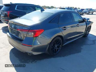 2022 Honda Civic Sedan Sport with VIN 2HGFE2F58NH597686, listed as a IAAI auction lot 41489050 with 44,161 mi miles. Bid and sale history available at carsss.com. Image 4.