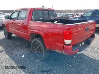 2016 Toyota Tacoma SR5 with VIN 5TFAX5GN0GX057704, listed as a IAAI auction lot 41890138 with 110,799 mi miles. Bid and sale history available at carsss.com. Image 3.