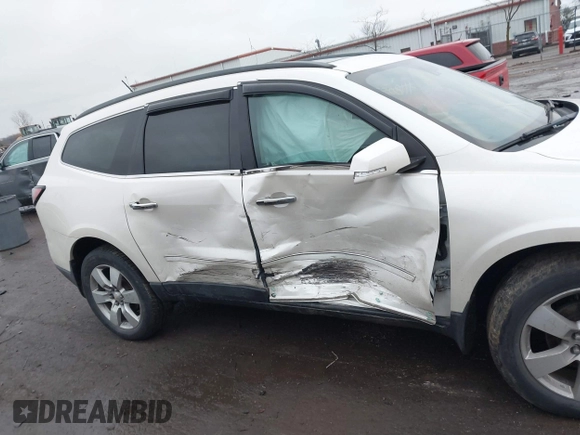 2014 Chevrolet Traverse LTZ z VIN 1GNKRJKDXEJ263349, wystawiony jako IAAI lot #41180521 z przebiegiem 141 564 mil mil oraz . Historia ofert i sprzedaży dostępna na DreamBid. Obrazek 12.