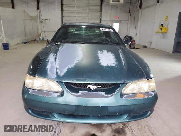 1996 Ford Mustang with VIN 1FALP4047TF229334, listed as a Copart auction lot 49257335 with 184,986 mi miles and Salvage Title. Bid and sale history available at carsss.com. Image 5.