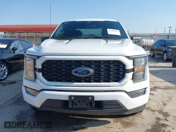 2023 Ford F-150 XL z VIN 1FTEW1CPXPKF87647, wystawiony jako IAAI lot #41486870 z przebiegiem 23 609 mil mil oraz . Historia ofert i sprzedaży dostępna na DreamBid. Obrazek 12.