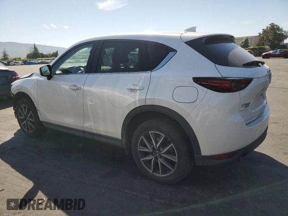 2017 Mazda CX-5 Grand Touring with VIN JM3KFBDL7H0202831, listed as a Copart auction lot 54943115 with 69,933 mi miles and Salvage Title. Bid and sale history available at carsss.com. Image 2.