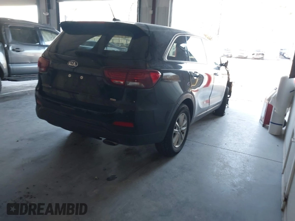 2019 Kia Sorento L with VIN 5XYPG4A35KG586766, listed as a IAAI auction lot 41316871 with 79,575 mi miles. Bid and sale history available at carsss.com. Image 4.