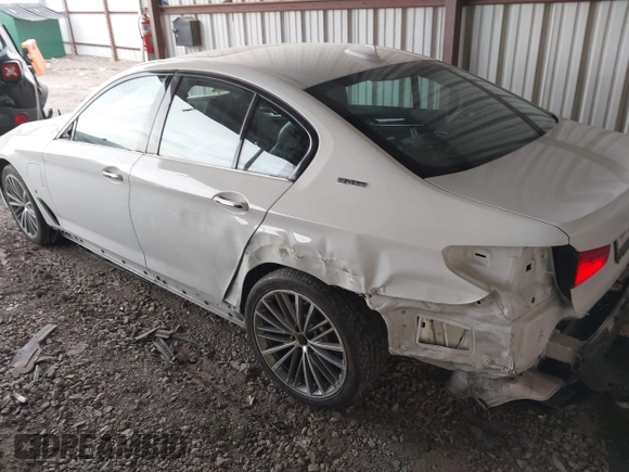 2018 BMW 5 Series 530e with VIN WBAJA9C57JB034128, listed as a IAAI auction lot 41800329 with 66,684 mi miles and . Bid and sale history available at DreamBid. Image 3.