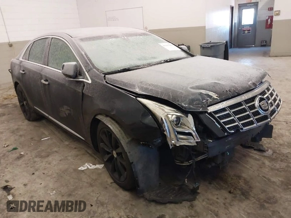 2013 Cadillac XTS Luxury with VIN 2G61P5S34D9200849, listed as a IAAI auction lot 41412189 with 134,932 mi miles. Bid and sale history available at carsss.com. Image 1.