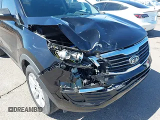 2012 Kia Sportage LX with VIN KNDPB3A2XC7274831, listed as a IAAI auction lot 41766816 with 50,235 mi miles. Bid and sale history available at carsss.com. Image 6.