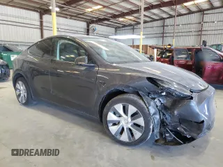 2023 Tesla Model Y Long Range z VIN 7SAYGDEE3PF862038, wystawiony jako Copart lot #57639325 z przebiegiem 11 020 mil mil oraz Szkoda całkowita • Salvage title. Historia ofert i sprzedaży dostępna na DreamBid. Obrazek 4.
