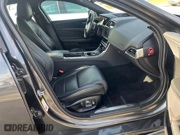 2019 Jaguar XE with VIN SAJAG4FV7KCP48855, listed as a Copart auction lot 48998825 with 98,923 mi miles and Clean Title. Bid and sale history available at DreamBid. Image 5.