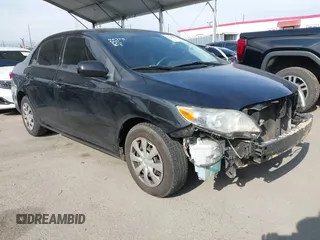 2011 Toyota Corolla L with VIN JTDBU4EE0B9154747, listed as a IAAI auction lot 42028887 with 141,569 mi miles. Bid and sale history available at carsss.com. Image 1.