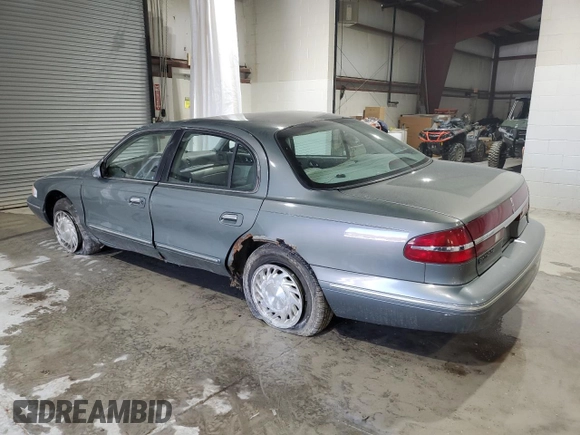 1997 Lincoln Continental with VIN 1LNLM97VXVY624609, listed as a Copart auction lot 73921634 with 119,746 mi miles and Salvage Title. Bid and sale history available at carsss.com. Image 2.