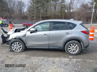 2013 Mazda CX-5 Touring with VIN JM3KE2CE9D0133348, listed as a IAAI auction lot 41357592 with 122,227 mi miles. Bid and sale history available at carsss.com. Image 13.