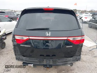 2013 Honda Odyssey Touring with VIN 5FNRL5H9XDB073706, listed as a IAAI auction lot 41591111 with 158,305 mi miles and . Bid and sale history available at carsss.com. Image 6.