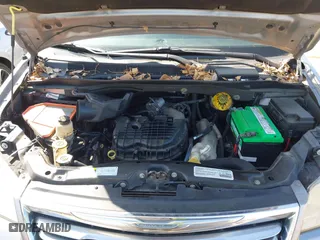 2014 Chrysler Town & Country Touring with VIN 2C4RC1BGXER211850, listed as a IAAI auction lot 41997769 with 164,406 mi miles. Bid and sale history available at carsss.com. Image 10.