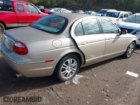 2005 Jaguar S-Type with VIN SAJWA01T45FN28372, listed as a IAAI auction lot 41461878 with Not Provided miles and . Bid and sale history available at DreamBid. Image 4.