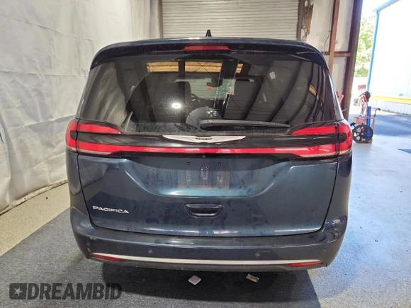 2023 Chrysler Pacifica Touring L с VIN 2C4RC1BG9PR596952, выставлен на аукционе Copart как лот 64998045 с пробегом 58 775 миль миль и На запчасти • Non repairable. История ставок и продаж доступна на DreamBid. Изображение 6.