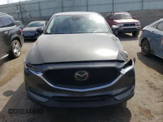 2018 Mazda CX-5 Grand Touring z VIN JM3KFBDM4J0300519, wystawiony jako Copart lot #51548745 z przebiegiem 102 853 mil mil oraz Szkoda całkowita • Salvage title. Historia ofert i sprzedaży dostępna na DreamBid. Obrazek 5.