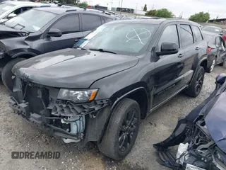 2021 Jeep Grand Cherokee Laredo X with VIN 1C4RJEAG9MC681776, listed as a IAAI auction lot 42116720 with 51,503 mi miles and . Bid and sale history available at DreamBid. Image 18.