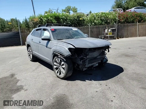 2021 Volkswagen Atlas SEL z VIN 1V2SE2CA9MC201392, wystawiony jako Copart lot #66317304 z przebiegiem Nie podano mil oraz Szkoda całkowita • Salvage title. Historia ofert i sprzedaży dostępna na DreamBid. Obrazek 12.