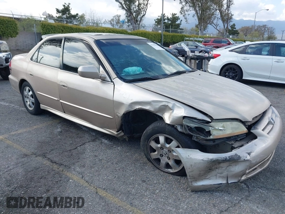 2001 Honda Accord EX z VIN 1HGCG66821A084618, wystawiony jako IAAI lot #41959020 z przebiegiem 272 671 mil mil oraz . Historia ofert i sprzedaży dostępna na DreamBid. Obrazek 1.