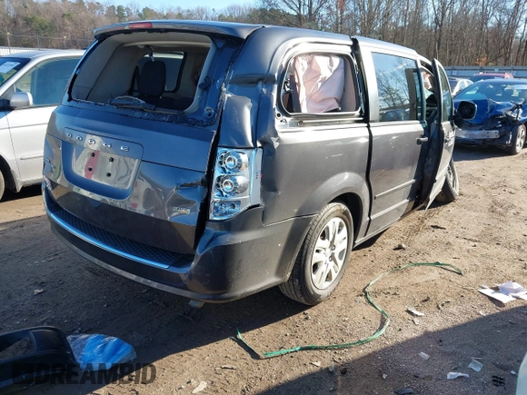2016 Dodge Grand Caravan SE with VIN 2C4RDGBG4GR382970, listed as a IAAI auction lot 41215666 with 93,534 mi miles and . Bid and sale history available at DreamBid. Image 4.