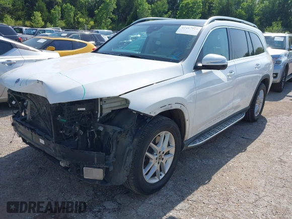 2020 Mercedes-Benz GLS 450 with VIN 4JGFF5KE9LA214090, listed as a IAAI auction lot 42487916 with 83,584 mi miles and . Bid and sale history available at DreamBid. Image 2.