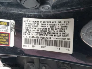 2007 Honda Civic Sdn EX with VIN 1HGFA16887L057776, listed as a IAAI auction lot 41901128 with 261,299 mi miles. Bid and sale history available at carsss.com. Image 9.