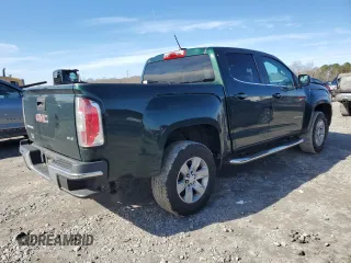 2015 GMC Canyon 2WD SLE with VIN 1GTG5BEA9F1139608, listed as a Copart auction lot 88911415 with 135,942 mi miles and Salvage Title. Bid and sale history available at carsss.com. Image 3.