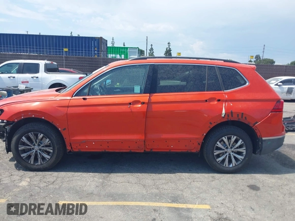 2018 Volkswagen Tiguan SEL with VIN 3VV3B7AX5JM007960, listed as a IAAI auction lot 42790694 with 39,854 mi miles and . Bid and sale history available at DreamBid. Image 14.