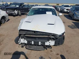 2020 Ford Mustang EcoBoost with VIN 1FA6P8TH6L5146258, listed as a IAAI auction lot 41878195 with 52,606 mi miles and . Bid and sale history available at DreamBid. Image 6.