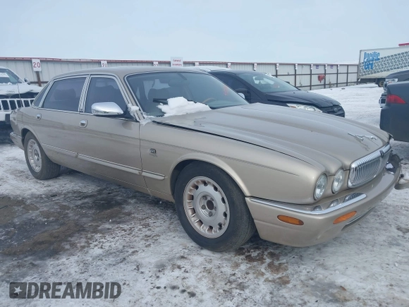 2000 Jaguar XJ Vanden Plas with VIN SAJDA24C7YLF13906, listed as a IAAI auction lot 41559262 with 122,586 mi miles and . Bid and sale history available at DreamBid. Image 1.