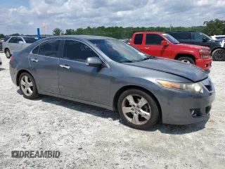 2009 Acura TSX z VIN JH4CU26699C031458, wystawiony jako Copart lot #60595125 z przebiegiem 188 954 mil mil oraz Czysty tytuł • Clean title. Historia ofert i sprzedaży dostępna na DreamBid. Obrazek 4.