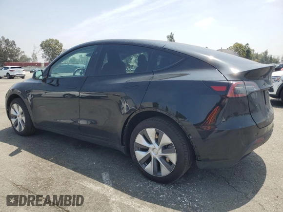 2024 Tesla Model Y Long Range with VIN 7SAYGDEE4RA228916, listed as a Copart auction lot 54921575 with 13,607 mi miles and Salvage title. Bid and sale history available at DreamBid. Image 2.