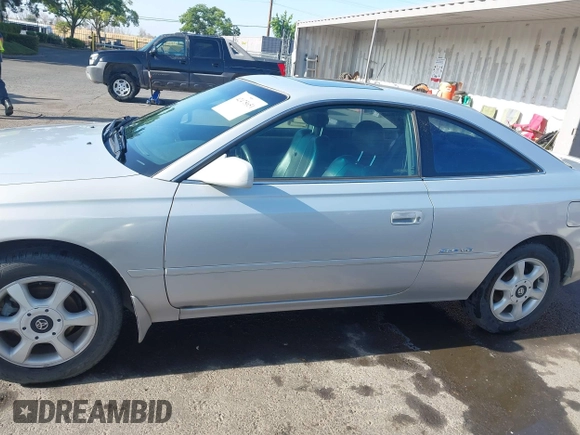 2001 Toyota Solara SE z VIN 2T1CF28P91C491927, wystawiony jako IAAI lot #42475651 z przebiegiem 142 628 mil mil oraz . Historia ofert i sprzedaży dostępna na DreamBid. Obrazek 15.