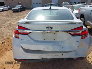 2018 Ford Fusion SE with VIN 3FA6P0H76JR227014, listed as a IAAI auction lot 41901203 with 147,454 mi miles and . Bid and sale history available at DreamBid. Image 16.