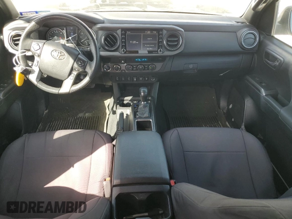 2021 Toyota Tacoma SR z VIN 3TMCZ5AN8MM387166, wystawiony jako Copart lot #49952935 z przebiegiem 63 175 mil mil oraz Szkoda całkowita • Salvage title. Historia ofert i sprzedaży dostępna na DreamBid. Obrazek 8.