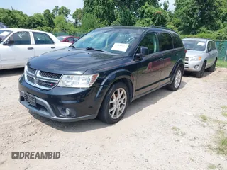 2012 Dodge Journey SXT with VIN 3C4PDDBG3CT144881, listed as a IAAI auction lot 42844117 with 184,804 mi miles and . Bid and sale history available at DreamBid. Image 2.