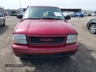 1999 GMC Sonoma with VIN 1GTCS1443X8530274, listed as a IAAI auction lot 41937187 with 210,244 mi miles. Bid and sale history available at carsss.com. Image 13.
