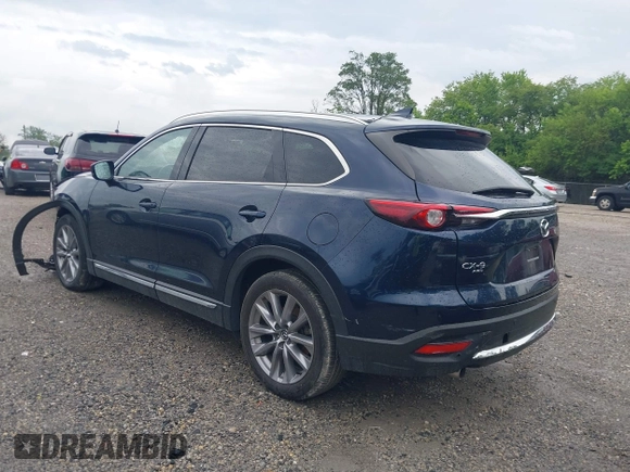 2021 Mazda CX-9 Carbon Edition z VIN JM3TCBDY7M0536005, wystawiony jako IAAI lot #42424129 z przebiegiem 48 005 mil mil oraz . Historia ofert i sprzedaży dostępna na DreamBid. Obrazek 3.