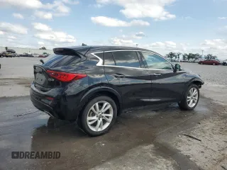 2018 Infiniti QX30 Luxury z VIN SJKCH5CP2JA051648, wystawiony jako Copart lot #52361895 z przebiegiem 90 717 mil mil oraz Szkody całkowita. Historia ofert i sprzedaży dostępna na DreamBid. Obrazek 3.