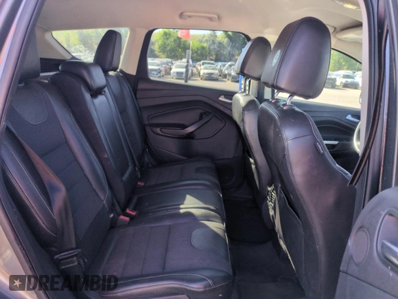 2013 Ford Escape Titanium with VIN 1FMCU0J93DUA78278, listed as a Copart auction lot 63519845 with 141,874 mi miles and Salvage title. Bid and sale history available at DreamBid. Image 11.