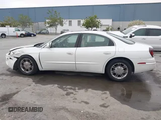 2001 Oldsmobile Aurora z VIN 1G3GS64C114109142, wystawiony jako IAAI lot #41974652 z przebiegiem 81 395 mil mil oraz . Historia ofert i sprzedaży dostępna na DreamBid. Obrazek 14.