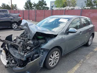 2013 Mazda 3 i Touring with VIN JM1BL1L85D1706095, listed as a IAAI auction lot 41938796 with 212,461 mi miles and . Bid and sale history available at carsss.com. Image 2.